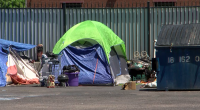 Bookstore pushes back against plans to remove homeless camp on property