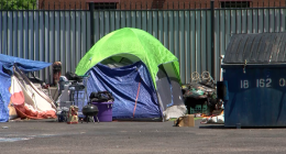 Bookstore pushes back against plans to remove homeless camp on property