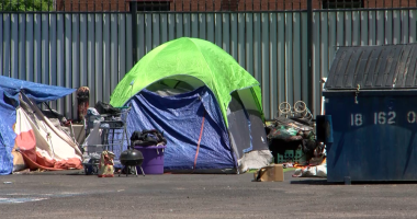 Bookstore pushes back against plans to remove homeless camp on property