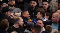 Chelsea's shame in the stands: Fans brawl with 8,000 Swedish supporters who got hold of tickets in home end - leaving club with questions to answer