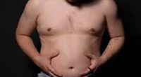 Couch potato turns into body-builder in one year with punishing gym regime... it's not just his body that's transformed