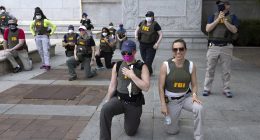 FBI agents seen kneeling in infamous George Floyd protest picture learn their fate