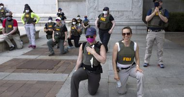 FBI agents seen kneeling in infamous George Floyd protest picture learn their fate