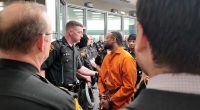 Father accused of killing sheriff's deputy, day after son shot by police