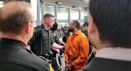 Father accused of killing sheriff's deputy, day after son shot by police