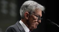 Fed holds rates steady despite pressure from Trump