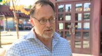 Former Chicago alderman ID'd as man who draped coat over sleeping train passenger