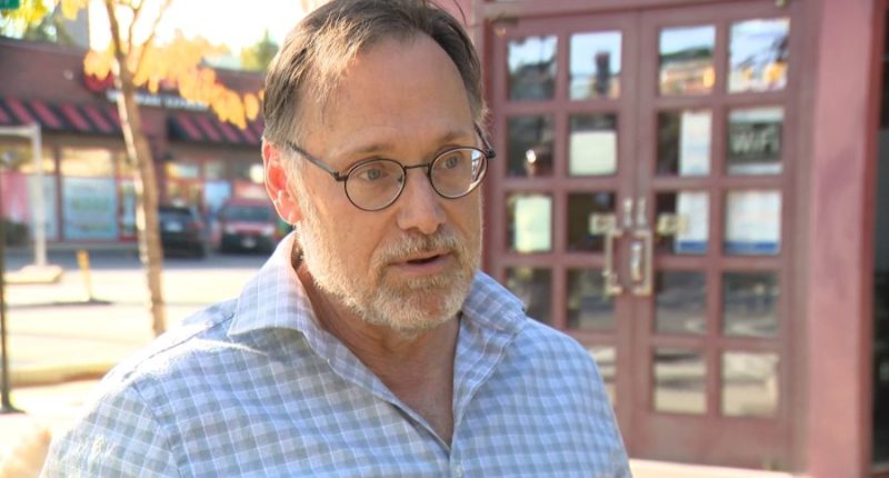 Former Chicago alderman ID'd as man who draped coat over sleeping train passenger