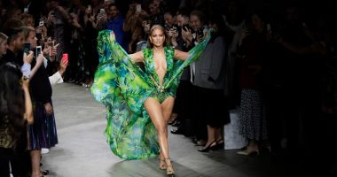 FILE - Actress Jennifer Lopez wears a creation as part of the Versace Spring-Summer 2020 collection, unveiled during the fashion week, in Milan, Italy, Friday, Sept. 20, 2019. (AP Photo/Luca Bruno, File)