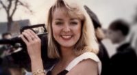 Jodi Huisentruit is pictured holding a camera.
