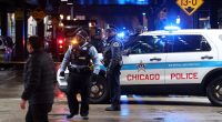 Justice Dept. cuts grants as Chicago tries to tamp down violence