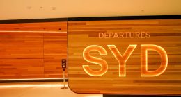 Man charged after allegedly committing indecent act at Sydney Airport