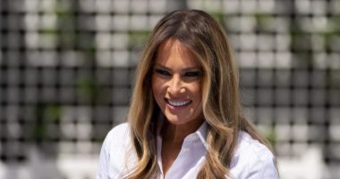 First lady Melania Trump participates in flag decorating during a Take Our Child to Work Day event in the Jacqueline Kennedy Garden at the White House, Tuesday, May 20, 2025, in Washington. (AP Photo/Alex Brandon)