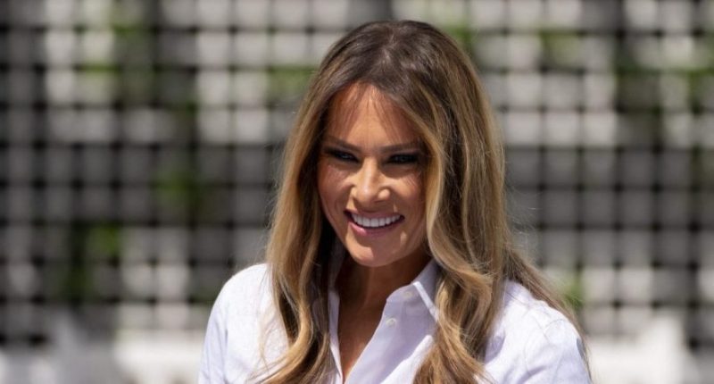 First lady Melania Trump participates in flag decorating during a Take Our Child to Work Day event in the Jacqueline Kennedy Garden at the White House, Tuesday, May 20, 2025, in Washington. (AP Photo/Alex Brandon)