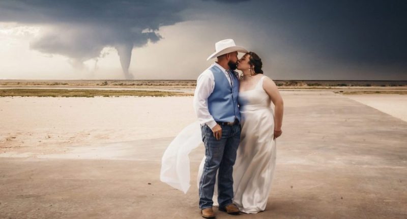 Newlyweds take wedding photos in front of tornado in New Mexico