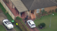 Police search Sydney neighbourhood for escaped detainee after tip-off