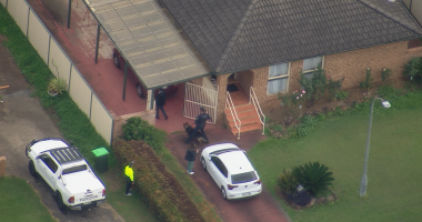 Police search Sydney neighbourhood for escaped detainee after tip-off