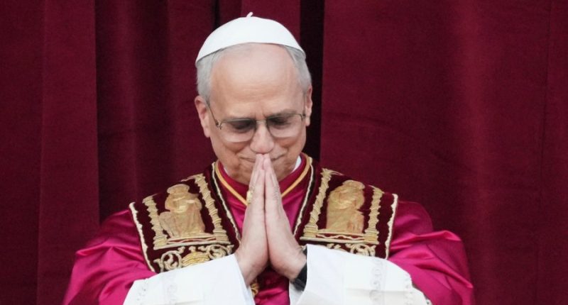 Pope Leo XIV holds his hands in prayer