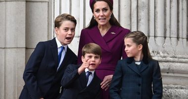 Prince George, Prince Louis, the Princess of Wales and Princess Charlotte watch the flypast at Buckingham Palace yesterday