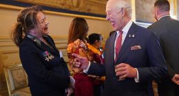 King Charles appeared in good spirits as he spoke to guests at a Windsor Castle reception for members of the Victoria Cross and George Cross Association today