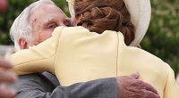 The Princess of Wales shared a warm embrace with a Holocaust survivor and his granddaughters as they reunited at a Buckingham Palace garden party yesterday