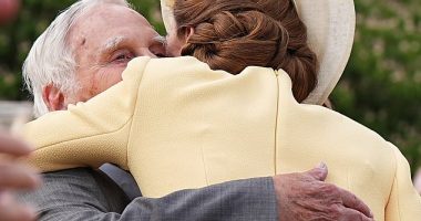 The Princess of Wales shared a warm embrace with a Holocaust survivor and his granddaughters as they reunited at a Buckingham Palace garden party yesterday