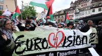 Pro-Palestine demonstrators march on Eurovision: Israeli massacre survivor singer faces barrage of hate as politically charged contest gets underway