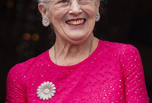 Queen Margrethe of Denmark (seen in May, 2024) remains in hospital but is in 'good spirits', the palace has revealed