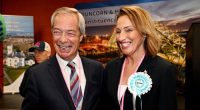 Nigel Farage and Sarah Pochin smile as they speak to the media during a vote recount