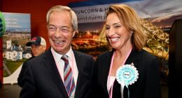 Nigel Farage and Sarah Pochin smile as they speak to the media during a vote recount