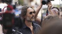 Russell Brand granted conditional bail after appearing in London court on rape and assault charges