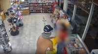 Shirtless armed robber caught on CCTV holding up service station