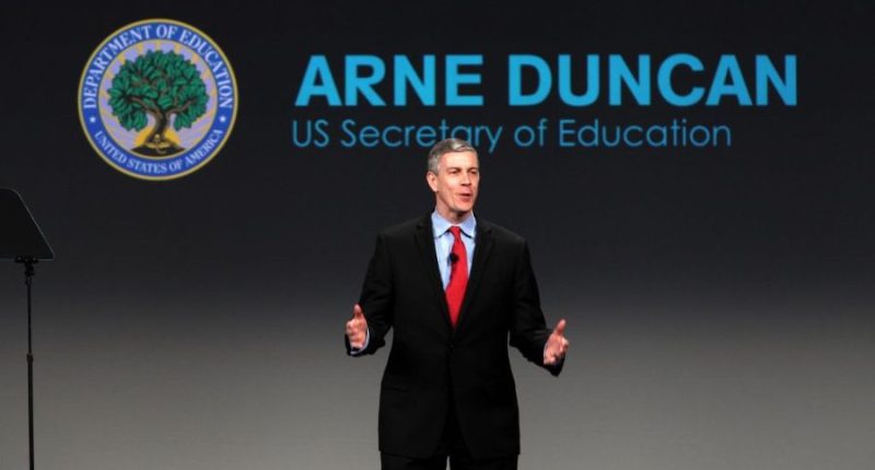 Arne Duncan speaking in front of a crowd.