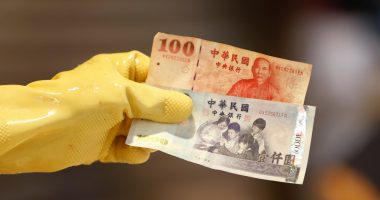 Taiwan dollar eases after historic surge as officials deny currency talks with U.S.