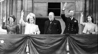 Britain's Prime Minister Winston Churchill, centre, joined the Royal Family - from left, Princess Elizabeth, Queen Elizabeth, King George VI and Princess Margaret - on the balcony of Buckingham Palace, London, England, on VE-Day