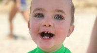 Tot diagnosed with cancer after parents spotted strange 'white glow' in one eye