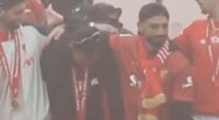 Trent Alexander-Arnold breaks down in tears during Liverpool's trophy parade... and is consoled by Mohamed Salah as he waves a final farewell to Reds fans after controversial exit