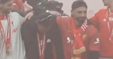 Trent Alexander-Arnold breaks down in tears during Liverpool's trophy parade... and is consoled by Mohamed Salah as he waves a final farewell to Reds fans after controversial exit