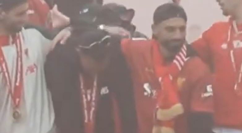 Trent Alexander-Arnold breaks down in tears during Liverpool's trophy parade... and is consoled by Mohamed Salah as he waves a final farewell to Reds fans after controversial exit
