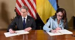US Treasury secretary Scott Bessent and Ukrainian First Deputy Prime Minister Yulia Svyrydenko sign a deal