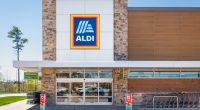 Aldi supermarket exterior with shopping carts.