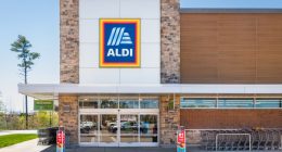 Aldi supermarket exterior with shopping carts.
