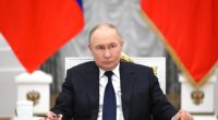 Vladimir Putin at a meeting in the Grand Kremlin Palace.