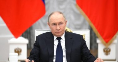 Vladimir Putin at a meeting in the Grand Kremlin Palace.