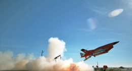 A BQM-34 unmanned aerial vehicle launching a Solid Fuel Integral Rocket Ramjet (SFIRR) missile.