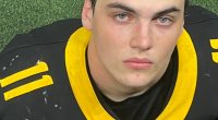 Photo of Austin Metcalf in a football jersey.