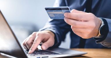 An alleged online scammer has been charged by Victoria police after evading authorities for over ten years.