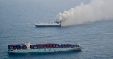 22 crew members rescued from lifeboat in North Pacific after ship carrying 3,000 cars catches fire