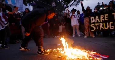 Anti-ICE protesters in Los Angeles spit on and burn American flag