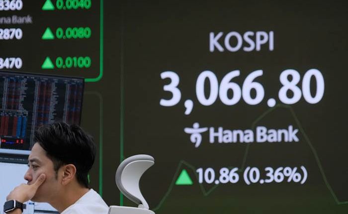 Asian shares are mixed after US stocks hit an all-time high